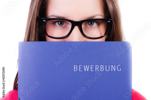 Photo: junge frau mit bewerbungsmappe junge frau mit bewerbungsmappe