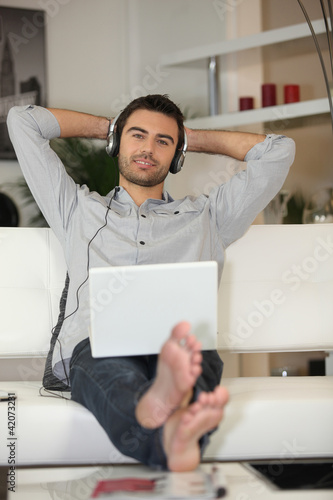 Photo: Man listening to tunes Man listening to tunes