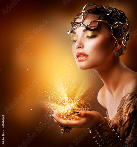 Photo: Fashion Girl Portrait. Golden Makeup Fashion Girl Portrait. Golden Makeup