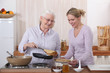 Mother and daughter cooking crepes