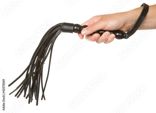 Photo: Strict Black Leather Flogging Whip in woman's hand Strict Black Leather Flogging Whip in woman's hand