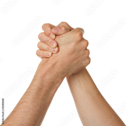 Photo: Man and woman in arm wrestlin Man and woman in arm wrestlin
