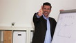 Video: Smiling business man holding his thumbs up at presentation with Smiling business man holding his thumbs up at presentation with