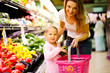 mother and daughter shopping in supermarket