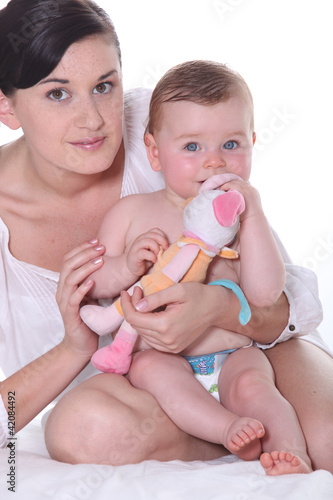 Photo: woman with baby girl woman with baby girl