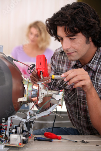 Photo: portrait of an electrician portrait of an electrician