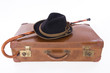 Retro koffer mit Spazierstock und Hut