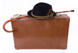 Retro koffer mit Spazierstock und Hut