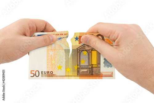 Photo: Hands tear money Hands tear money