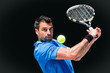 Tennisspieler bei der Rückhand