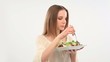 Video: Beautiful young woman eating salad; Full HD Photo JPEG Beautiful young woman eating salad; Full HD Photo JPEG