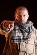Foto: Army officer in camouflage pointing his finger at camera Army officer in camouflage pointing his finger at camera