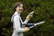 Foto: Young woman during gardening Young woman during gardening