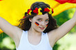 german soccer fan waving her flag