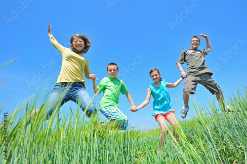 Photo: kids play in wheat field kids play in wheat field