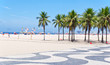Photo: View of Copacabana beach with palms and mosaic of sidewalk View of Copacabana beach with palms and mosaic of sidewalk