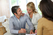 Couple meeting advisor at home