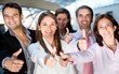 Business team with thumbs up