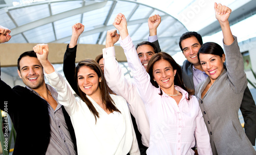 Photo: Business group with arm up Business group with arm up