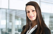 Smiling businesswoman in her office