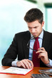 Businessman at work in his office