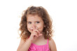 child finger to lips