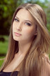 Portrait of attractive young woman with long hair