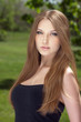 Portrait of a beautiful young woman with long hair