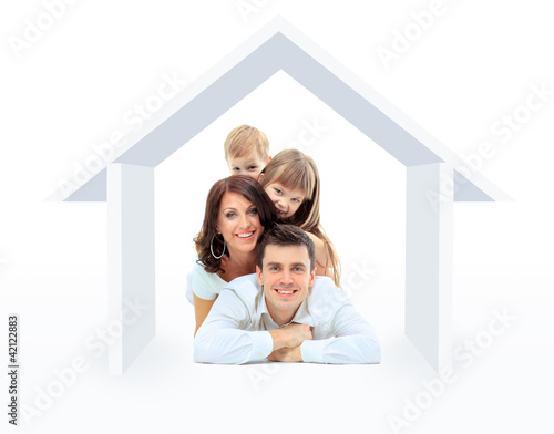 Photo: Beautiful family in a house - isolated over a white Beautiful family in a house - isolated over a white