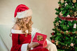 Young woman in santa hat