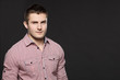 Photo: Closeup portrait of serious young handsome male Closeup portrait of serious young handsome male