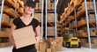 Photo: Female courier at warehouse a Female courier at warehouse a