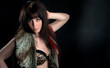 Pretty and mysterious brunette in leopard skin bra