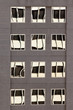 Facade with reflections of building on windows
