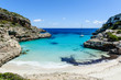 Photo: Sailing boat at anchor. Paradise wild bay and beach. Sailing boat at anchor. Paradise wild bay and beach.