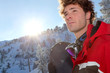 young man snowboarding