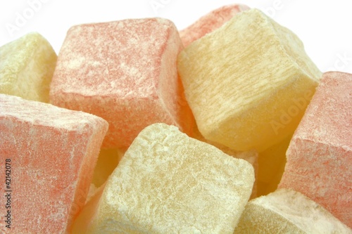 Photo: Turkish Delight on a white background. Close up Turkish Delight on a white background. Close up