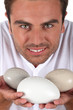 Man with stones in hand