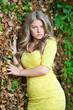 Foto: Young attractive girl with yellow dress outdoor on the field Young attractive girl with yellow dress outdoor on the field