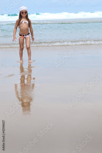 Photo: Little girl on the beach Little girl on the beach