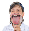 Photo: boy looking through a magnifying glass boy looking through a magnifying glass