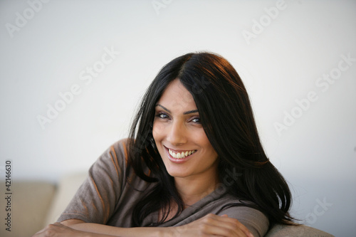Photo: A smiling young woman A smiling young woman