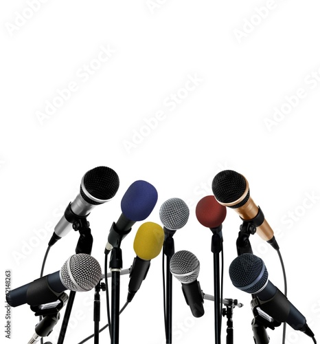 Photo: Press conference with standing microphones Press conference with standing microphones