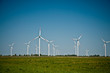 Photo: Wind turbine farm on rural terrain Wind turbine farm on rural terrain
