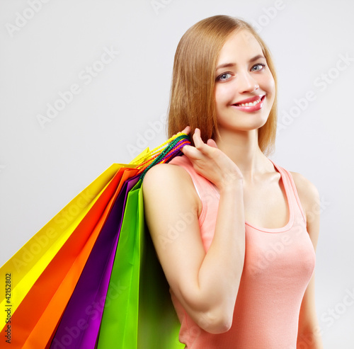 Photo: Stylish Girl with shopping bags Stylish Girl with shopping bags