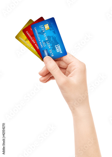 Photo: Isolated рand holding pack of credit card Isolated рand holding pack of credit card