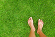 Photo: Foot over green grass Foot over green grass