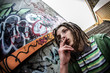 smoky young man with dreadlocks in subway