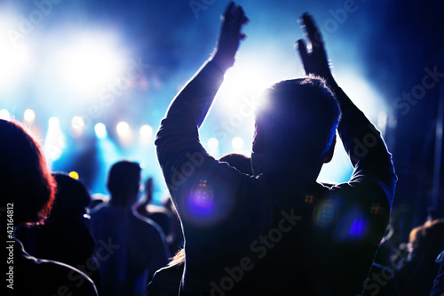 Photo: People having fun on music concert and/or disco People having fun on music concert and/or disco