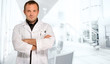 Man in lab coat in a business environment
